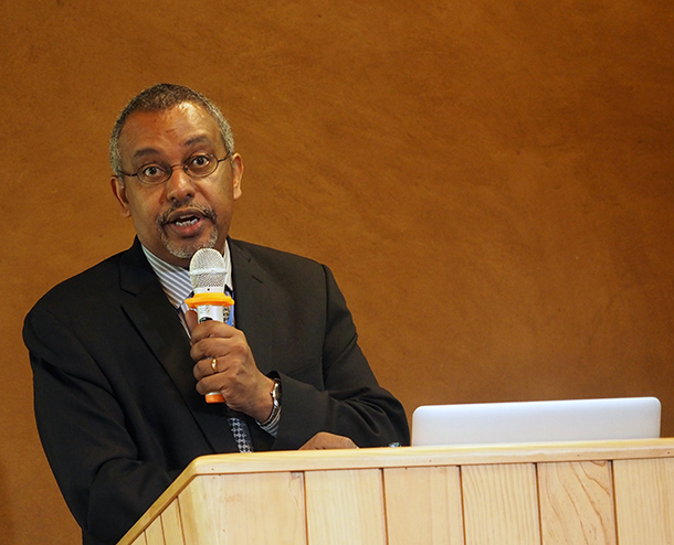 Kiros Berhane speaks in Ethiopia as part of a GEOHealth workshop.