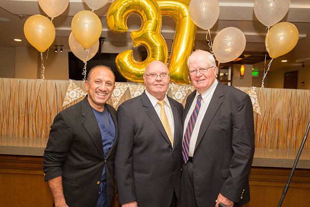 From left, Inderbir Gill, Gary Lieskovsky and Donald Skinner are seen during a retirement party for Lieskovsky, held June 28 on the Health Sciences Campus.
