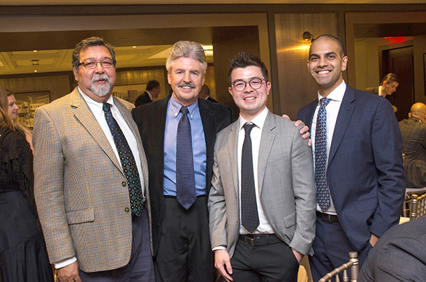 Stuart Boyd, second from left, is seen with his former fellows, Francisco Martins, Jeff Loh-Doyle and Mukul Patil.