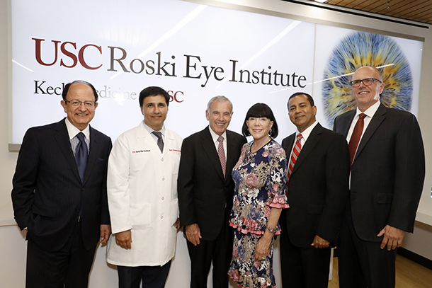 From left, C. L. Max Nikias, Mark Humayun, Edward Roski, Gayle Roski, Rohit Varma and Tom Jackiewicz are seen during the Sept. 7 unveiling of the remodeled USC Roski Eye Institute clinical space on the Health Sciences Campus.