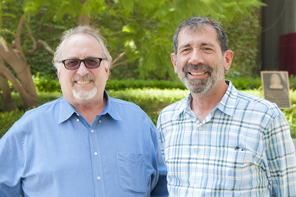 Daryl Davies, left, of USC School of Pharmacy and Joseph Cocozza of Keck School of Medicine of USC lead the STAR/EHA program, a cross-departmental collaboration at USC that lets high school students explore careers through specialized curricula and research at faculty labs.