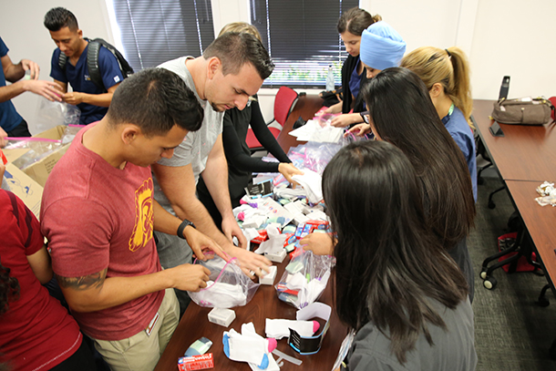 Students from the Class of 2019 and 2020 joined forces to pack kits to be donated to the Union Station Homeless Services Adult Center in Pasadena in celebration of PA Week.