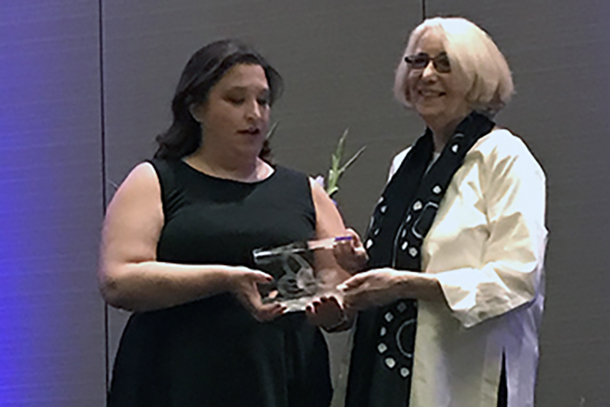 Laurie Eisenberg, right, receives the 2018 Jerger Career Award for Research in Audiology from the American Academy of Audiology (AAA) at the 2018 Academy Honors ceremony in Nashville, Tennessee, on April 19.