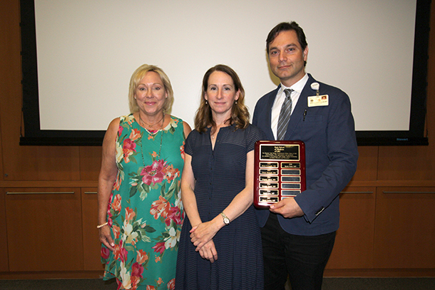 From left, Debbie Massaglia, president of the Roxanna Todd Hodges Stroke Foundation, joins Karen Furie and Nerses Sanossian after a lecture on July 31 at the Health Sciences Campus.