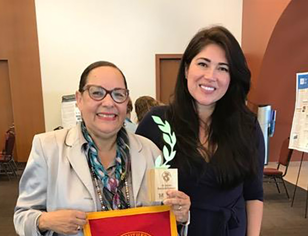 Lourdes Baezconde-Garbanati, left, with Darcie Greene, CEO of Latinas Contra Cancer, conference lead organization.