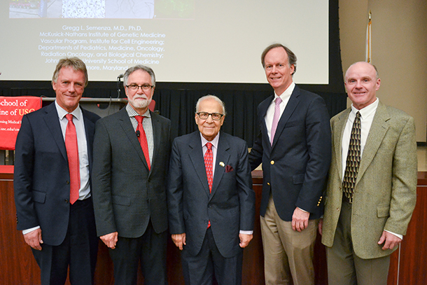 From left, Sir Peter Ratcliffe, Gregg L. Semenza, Shaul Massry, William G. Kaelin and Tom Buchanan are seen before the Massry Prize lectures on Sept. 20 at Mayer Auditorium.