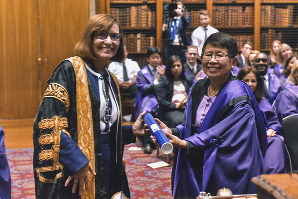 Dame Jane Dacre, DBE, MD, president of the RCP London, awards an honorary fellowship to May Win.