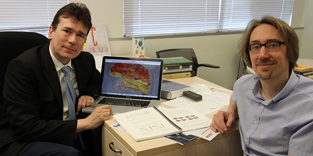 Paul Thompson, left, and Greg Ver Steeg have teamed up to use machine learning to identify potential blood-based markers of Alzheimer’s disease that could help with earlier diagnosis.