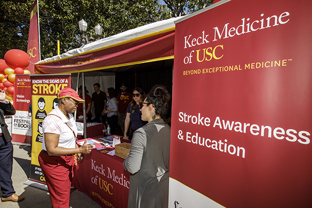 Wanda Austin visits the stroke awareness and education booth on the first day of the Los Angeles Times Festival of Books held April 13 on the University Park Campus.