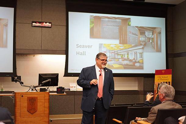 Vassilios Papadopoulos shows renderings of the USC School of Pharmacy’s future Margaret and John A. Biles Student Center during the school’s semi-annual Town Hall meeting, held March 28 in the Pharmaceutical Sciences Center. The new student center, to be located on the fourth floor of Seaver Hall, is scheduled for completion in June 2020. 