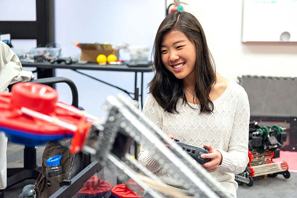 USC Viterbi freshman Bethany Chen tests a competition robot she is programming as part of the USC VEX Robotics Team.