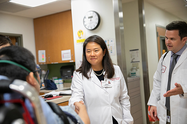 Tarina Kang, center, has been named medical director of the Evaluation and Treatment Clinic.