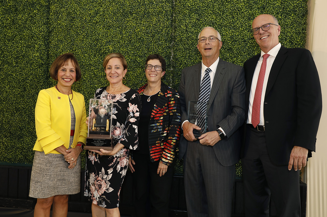 From left, USC President Carol L. Folt, USC Norris Director Caryn Lerman, Keck School Dean Laura Mosqueda, USC Trustee Kris Popovich and Keck Medicine CEO Tom Jackiewicz are seen during the celebration of Lerman as the H. Leslie and Elaine S. Hoffman Cancer Research Chair.