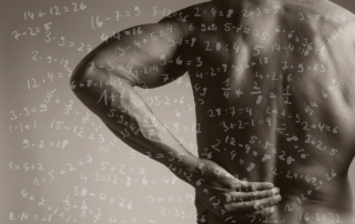 Hand-drawn math equations overlay an image of a man grasping his lower back.