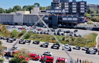 Police and fire vehicles line up outside USC Verdugo Hills Hospital.