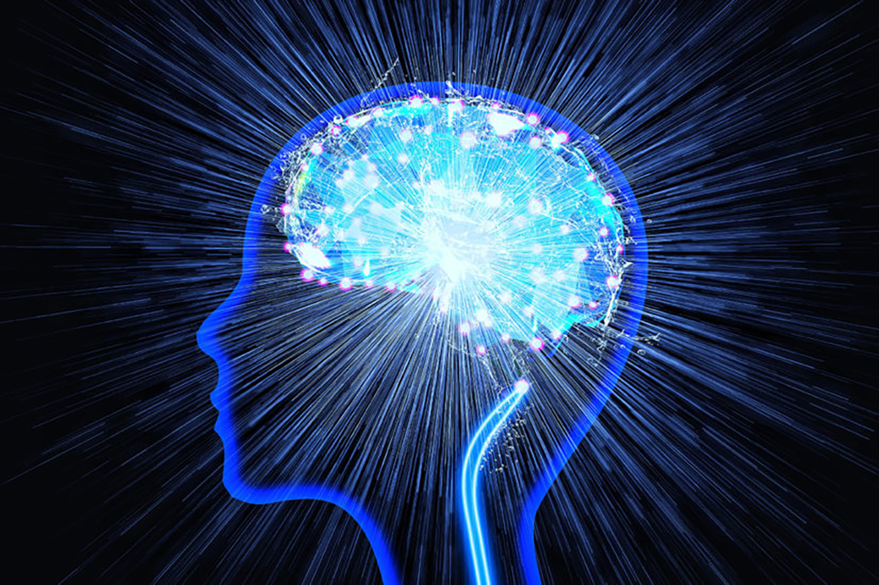 An illustration depicts a brightly glowing brain outlined by a human profile.