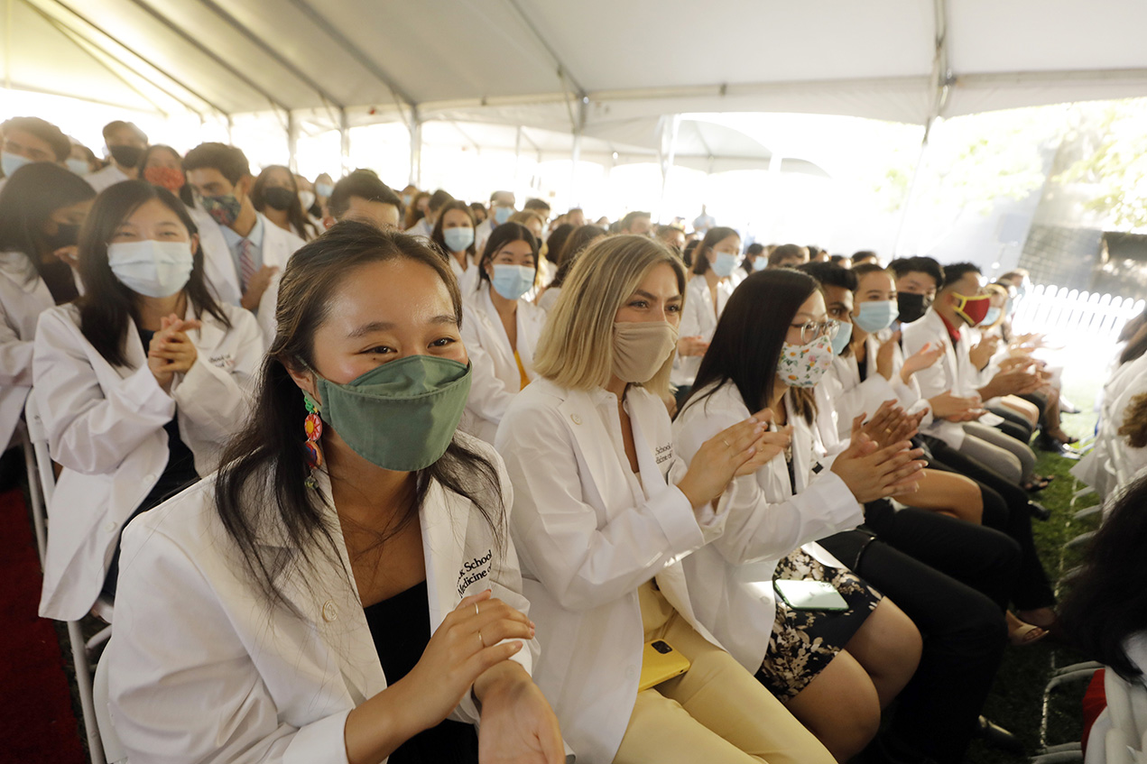 First-year MD candidates cheer during the White Coat ceremony, held Aug. 6, 2021, on the Health Sciences Campus.