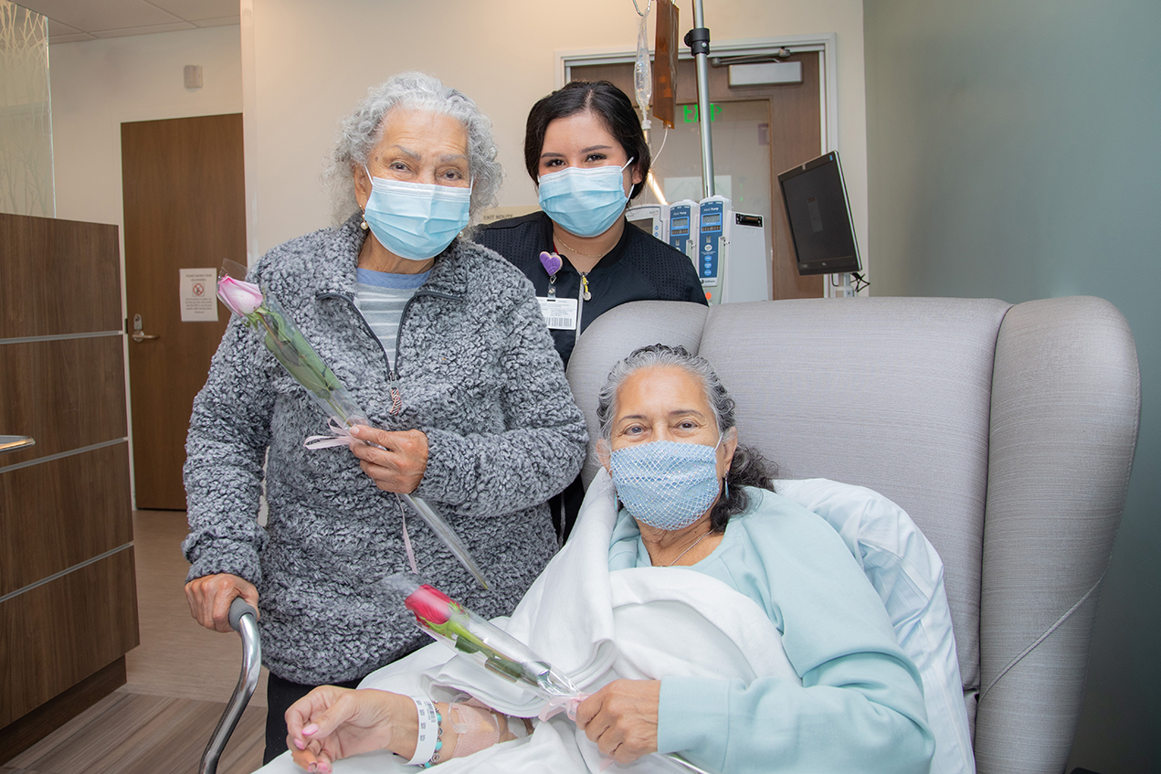 Distributing roses to celebrate mothers undergoing chemotherapy and infusion treatments has become an annual tradition.