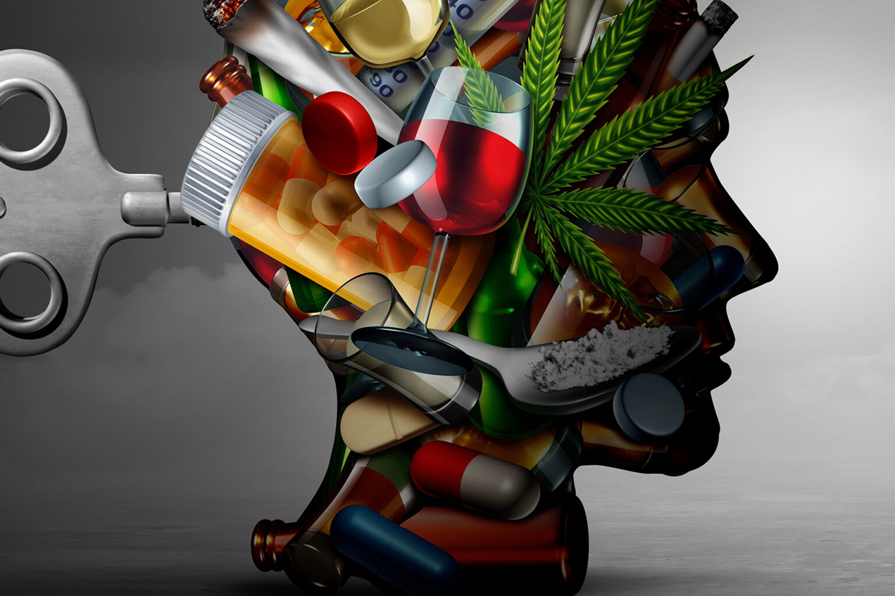 An image of a mannequin's head is made up of drug and alcohol paraphernalia