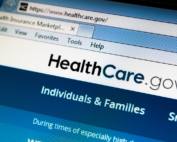 A closeup shows the header on the Healthcare.gov website