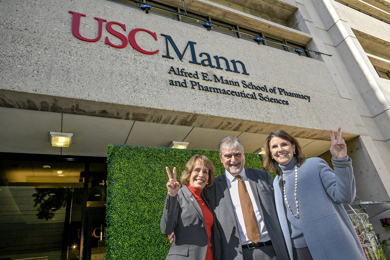 USC President Carol L. Folt, PhD (left), Dean Vassilios Papadopoulos, PharmD, PhD (center), and Board of Trustees Chair Suzanne Nora Johnson, JD (right), at the Mann School of Pharmacy naming ceremony on Feb. 8. 