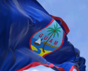 The Guam flag waves in a breeze