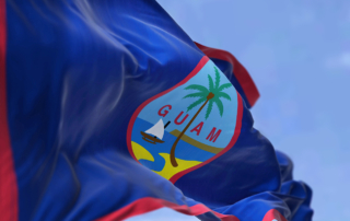 The Guam flag waves in a breeze