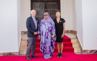 Dr. Paul Gilbert and Dr. Aneesah Smitha with Tanzanian President Samia Suluhu Hassan