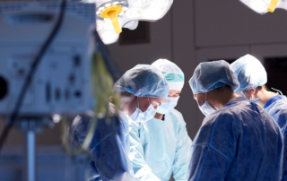 Surgeons work in a sustainable operating room.