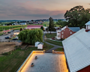 An aerial view spans a rural community where men lead shorter, less healthy lives