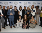 Marketing, communications and public relations staff members from Keck Medicine of USC smile with their PRism Awards.