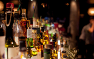 Alcohol stands on a bar shelf