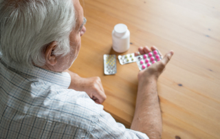 A Medicare Part D enrollee considers the cost of his prescription drugs