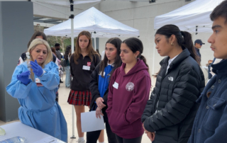 At USC Verdugo Hills Hospital’s Day of Discovery on March 7, students watched a demonstration of how to prepare a sterile IV drip. (Photo/Laura Nuno)