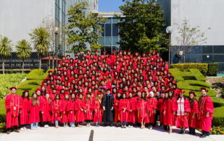 Vassilios Papadopoulos, DPharm, PhD, dean of the USC Alfred E. Mann School of Pharmacy and Pharmaceutical Sciences, with the class of 2025.