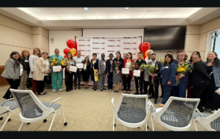 Annette Sy, DNP, RN, NE-BC, Ceonne Houston, DNP, RN, CSSBB, NEA-BC, CPHQ, and Awa Jones, RN, BSN, MSHCM, stand amidst the 2025 Nurses Week award recipients and Keck Medical Center nursing leadership