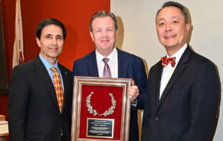 Daniel F. Martin, MD (center), receives the Laureate Award from Mark Humayun, MD, PhD (left), and J. Martin Heur, MD, PhD