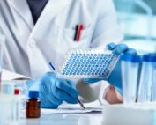 In a lab, a scientist conducts biomedical research