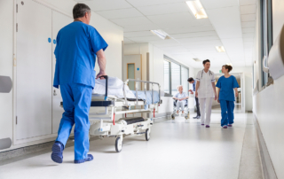 Providers from contracted medical groups work in a hospital for increased stipends